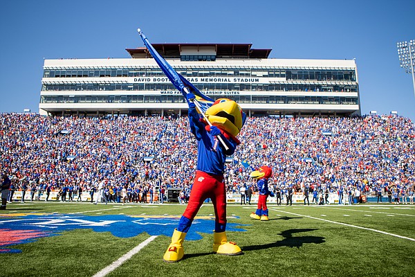 Big Jay waves the Jayhawk flag near midfield in front of a packed house on Saturday, Sept. 24, 2022, when Kansas knocked off Duke 35-27 to move to 4-0. 
