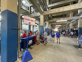 One of the new cash-only concession stands in the outer concourse of David Booth Kansas Memorial Stadium is shown here about an hour before KU's recent home game against Iowa State on Saturday, October 1, 2022. 