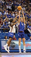 Kansas guard Gradey Dick (4) goes up for a three over Kansas guard Joseph Yesufu (1) during Late Night in the Phog on Friday, Oct. 14, 2022, at Allen Fieldhouse.