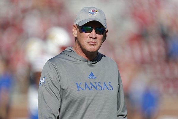 Kansas head coach Lance Leipold before the start of an NCAA college football game against Oklahoma on Saturday, Oct. 15, 2022, in Norman, Okla. (AP Photo/Alonzo Adams)