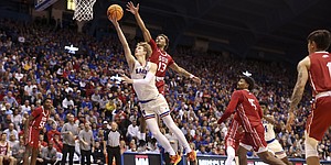 Kansas guard Gradey Dick (4) gets under Southern Utah guard Dee Barnes (13) for a shot during the first half, Friday, Nov. 18, 2022 at Allen Fieldhouse.